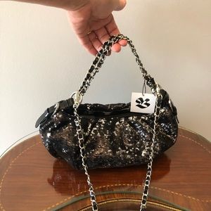 Black and silver sequined handbag